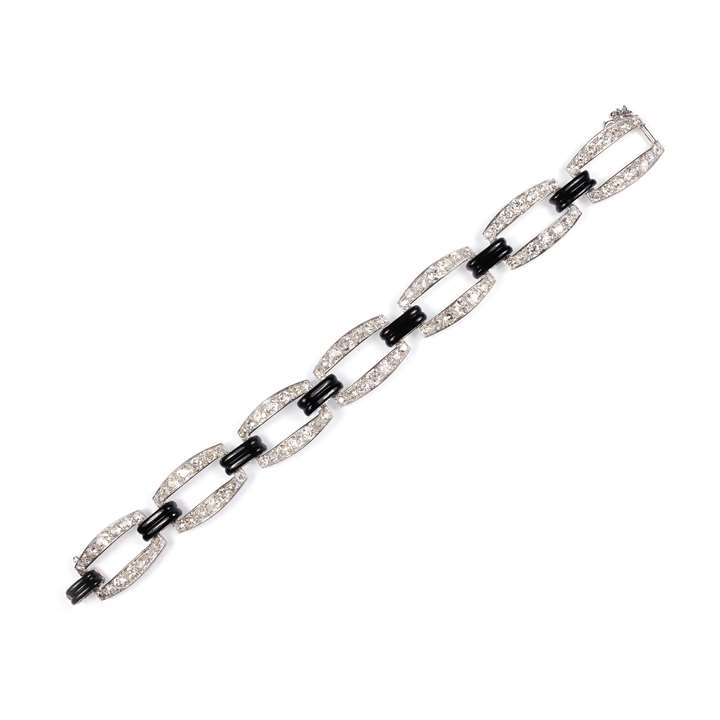 Art Deco diamond and black enamel open link bracelet retailed by Fontana